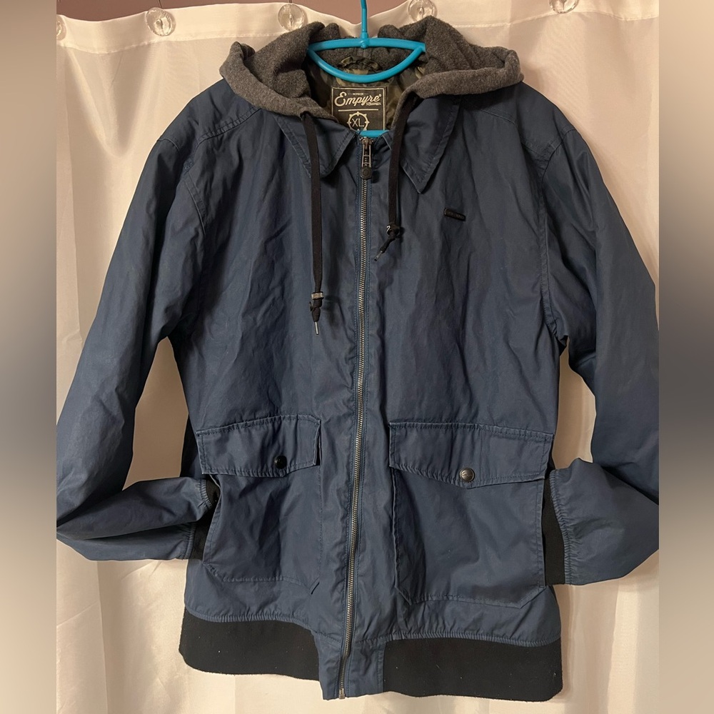 Empyre MCMXCIX men’s lightweight jacket. Blue with grey hood and camo lining. XL